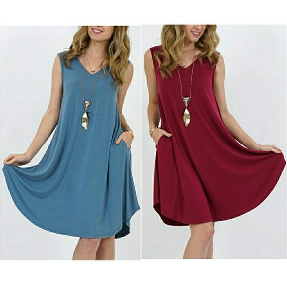 **SOLD OUTNEW V NECK SLVLSS ROUND HEM POCKET DRESS - Picture 2 of 6